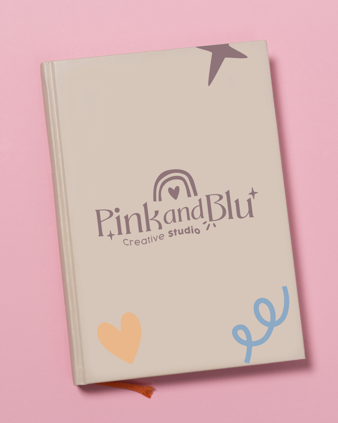 A Beige customized agenda in a pink background