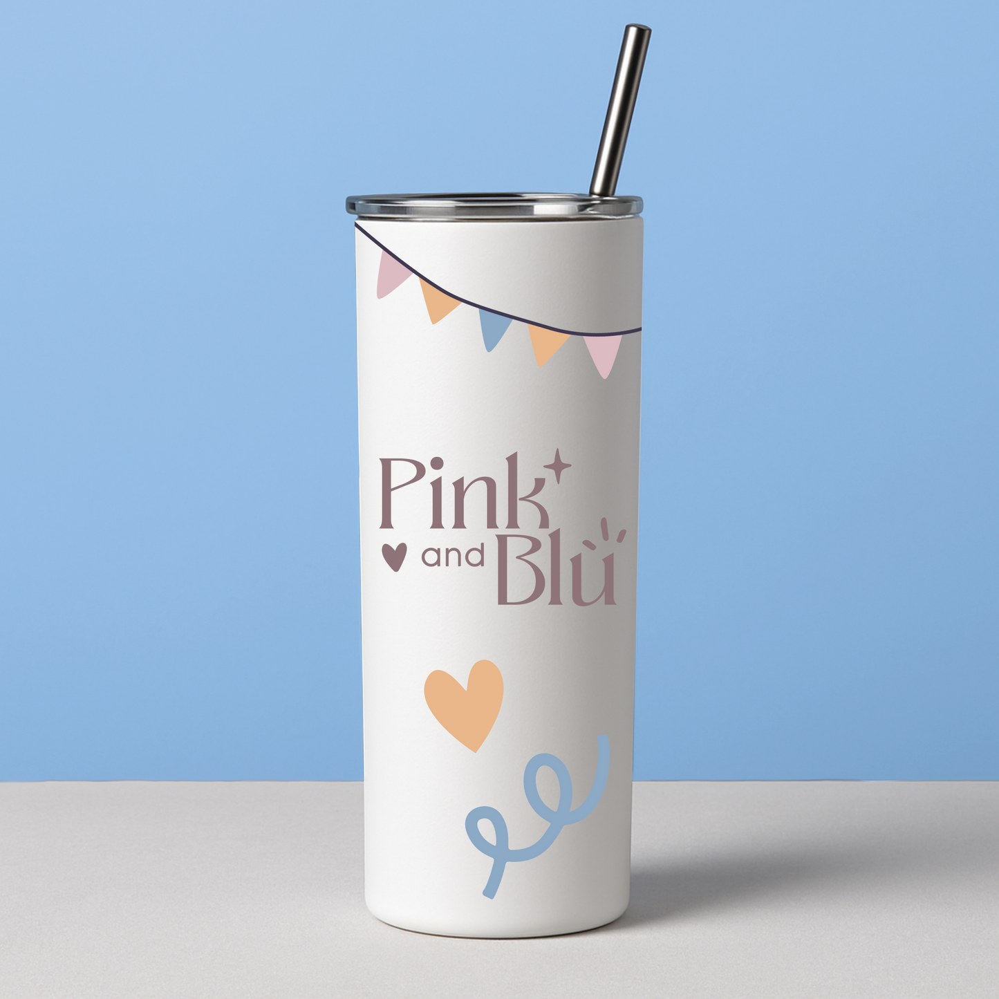 White tumbler with 'Pink & Blé' text and colorful design on a blue background