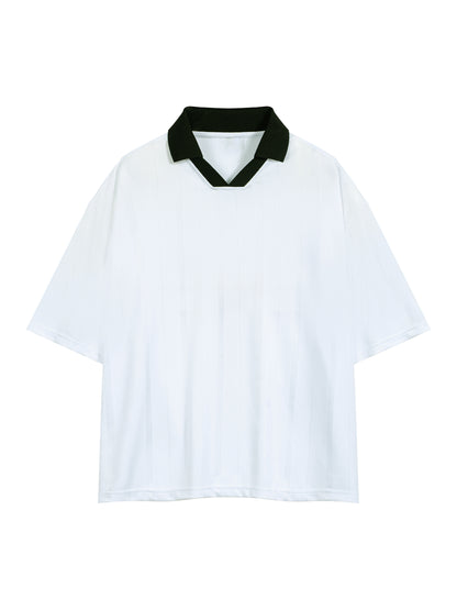 A white short-sleeve polo shirt with a contrasting black collar, displayed flat against a solid white background.