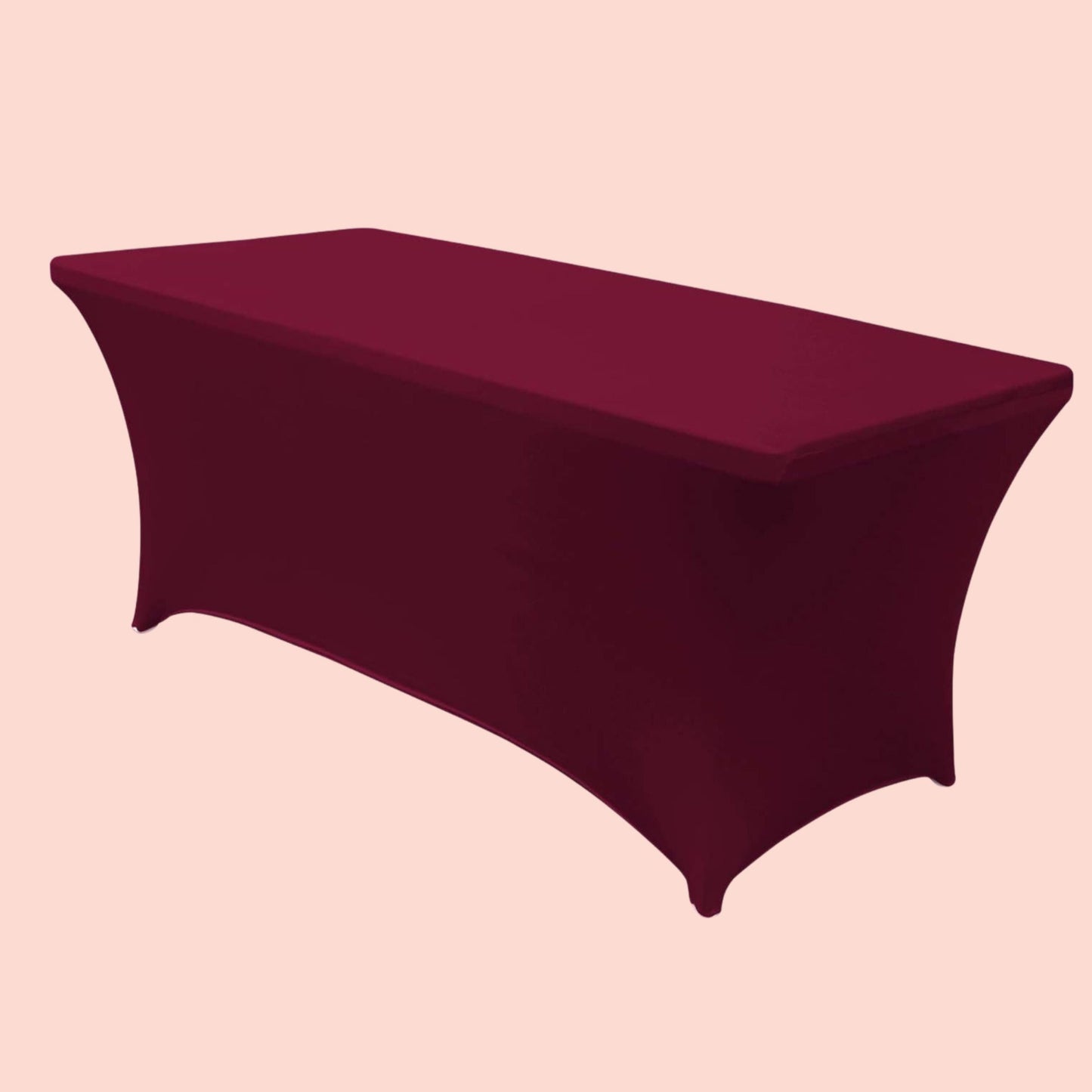 Maroon tablecloth on a rectangular table against a beige background