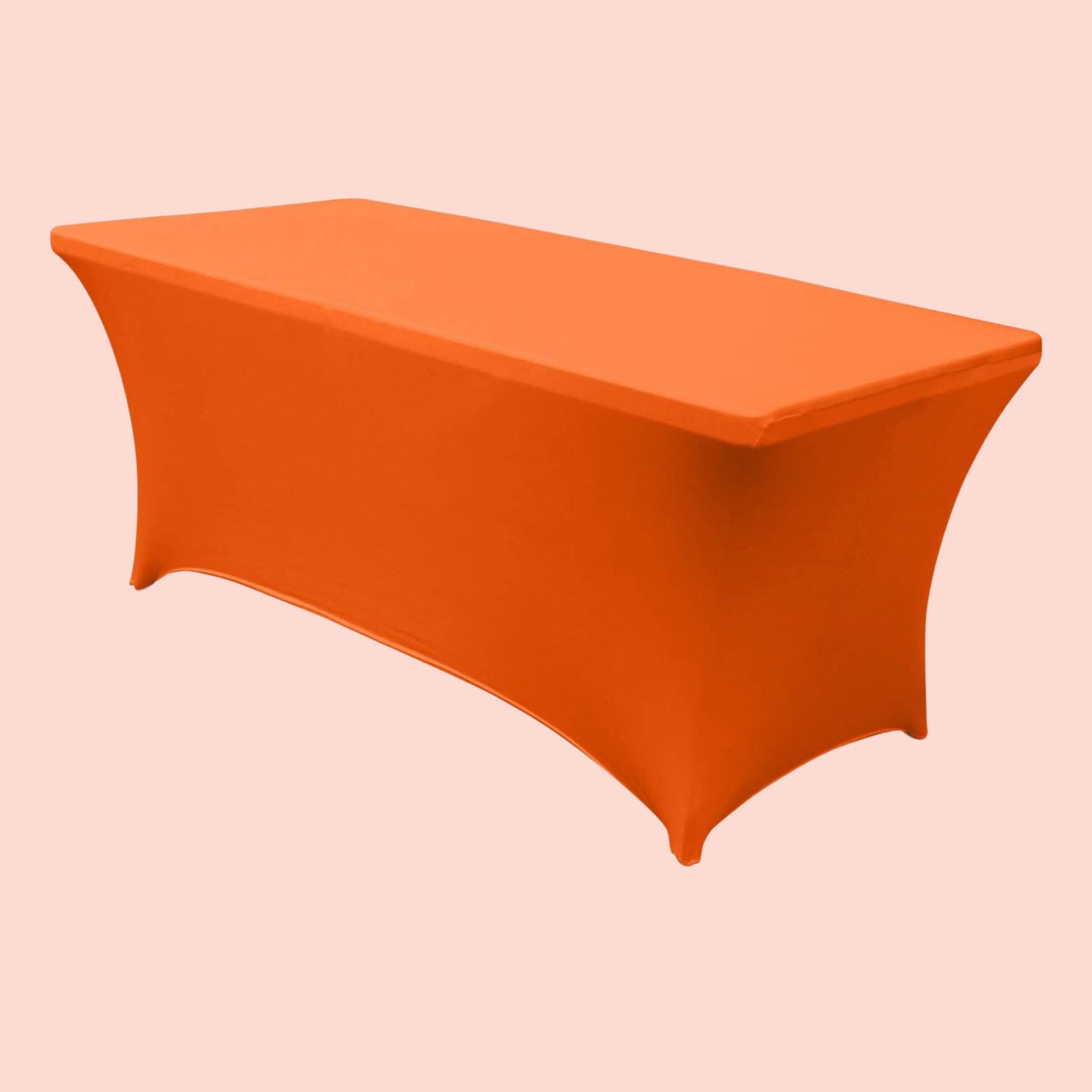 Orange tablecloth on a rectangular table against a beige background