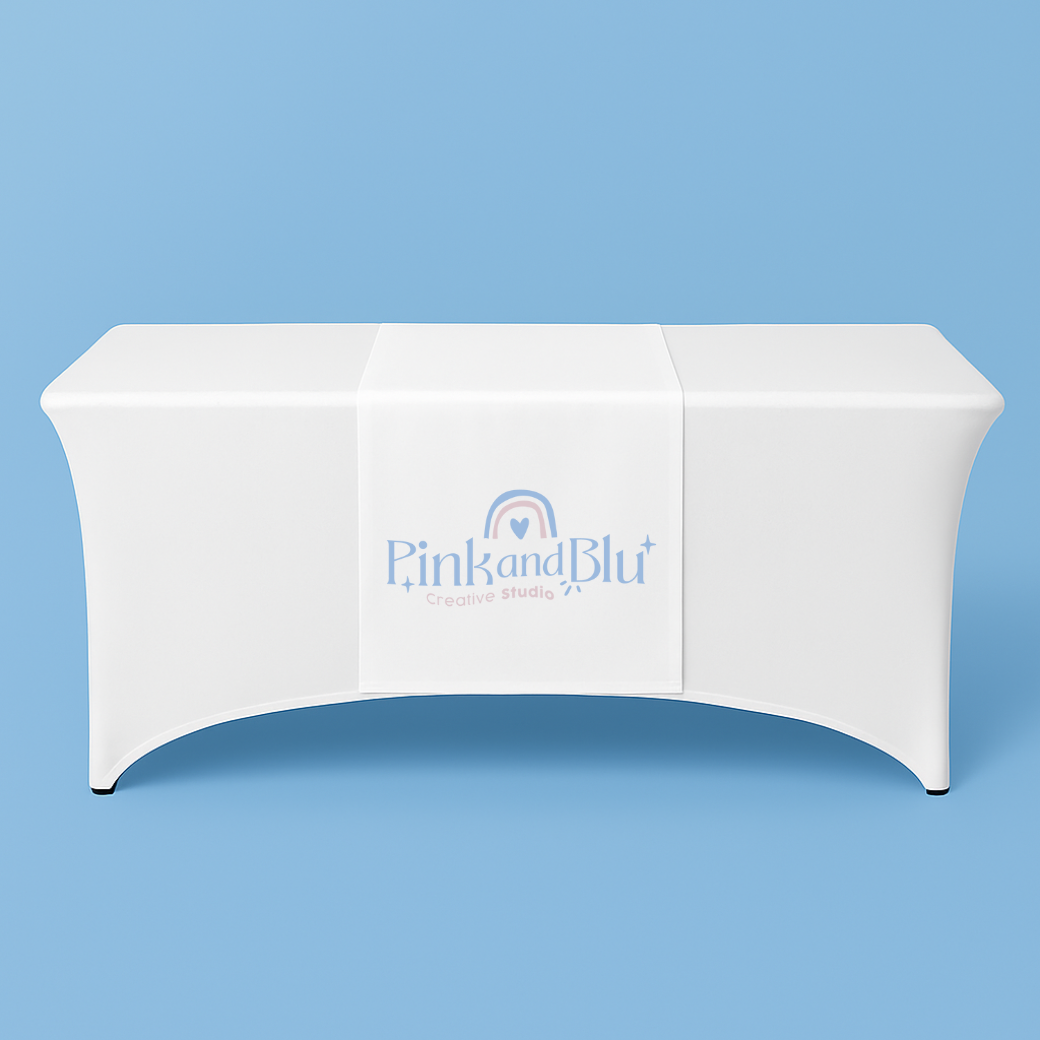 White tablecloth with 'Pink and Blu' logo on a blue background
